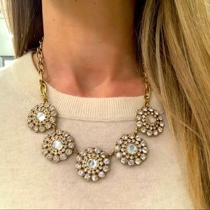 Gold necklace with crystal flowers
